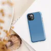 flat solid sky blue with a soft textile texture, medium cornflower-to-steel blue tone, no pattern or imagery on Glossy Clear Sky Blue Solid Tough Case for iPhone - default view