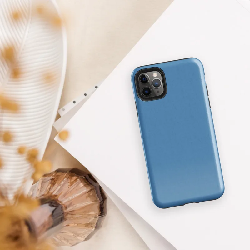 flat solid sky blue with a soft textile texture, medium cornflower-to-steel blue tone, no pattern or imagery on Glossy Clear Sky Blue Solid Tough Case for iPhone - default view