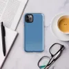 flat solid sky blue with a soft textile texture, medium cornflower-to-steel blue tone, no pattern or imagery on Glossy Clear Sky Blue Solid Tough Case for iPhone - default view