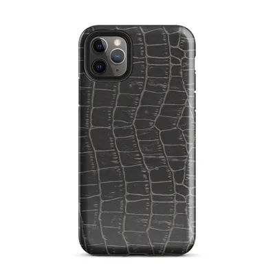 close-up black crocodile scale skin texture with raised interlocking rectangular scales and deep charcoal tones on Glossy Midnight Crocodile Armor Tough Case for iPhone - default view
