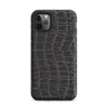 close-up black crocodile scale skin texture with raised interlocking rectangular scales and deep charcoal tones on Matte Midnight Crocodile Armor Tough Case for iPhone - default view