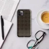 dark brown octagonal tile pattern with small diamond accents at intersections, resembling aged cobblestone in a top-down perspective on Glossy Dark Cobblestone Armor Tough Case for iPhone - default view