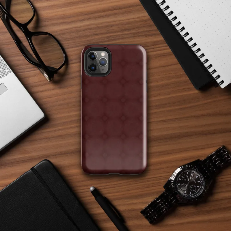 tone-on-tone deep crimson repeating lattice of interlocking circles and diamond accents with a soft textured burgundy background on Glossy Crimson Lattice Elegance Tough Case for iPhone - default view