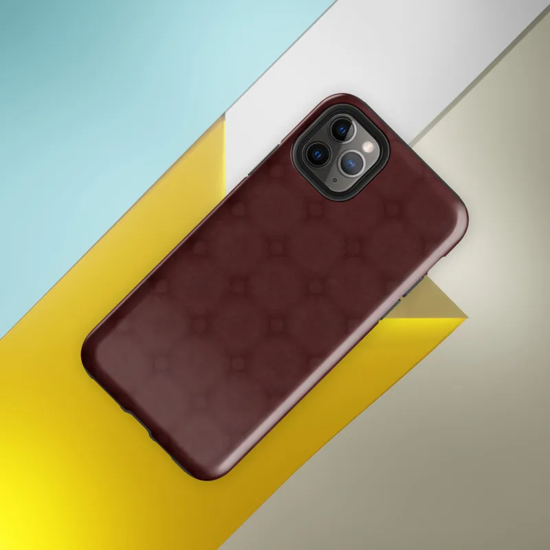 tone-on-tone deep crimson repeating lattice of interlocking circles and diamond accents with a soft textured burgundy background on Glossy Crimson Lattice Elegance Tough Case for iPhone - default view