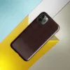 deep oxblood crimson repeating lattice of rounded squares with dot intersections on a near-black background on Glossy Dark Crimson Lattice Shield Tough Case for iPhone - default view
