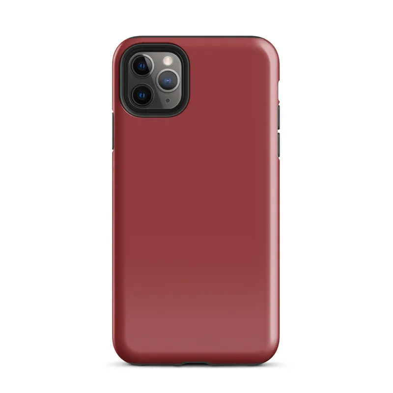 flat solid deep crimson red with no pattern or imagery, rich muted scarlet tone filling the entire surface on Glossy Crimson Red Solid Bold Tough Case for iPhone - default view