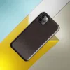 close-up crackled dark espresso brown leather grain texture with subtle natural variation and organic surface detail on Glossy Dark Leather Grain Tough Case for iPhone - default view
