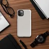 solid warm gray surface with subtle tonal texture variation across a smooth matte finish on Glossy Classic Warm Gray Minimal Tough Case for iPhone - default view