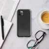 close-up black leather surface with natural grain, subtle creases, and organic texture variations across a deep charcoal tone on Glossy Midnight Black Leather Tough Case for iPhone - default view