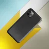 close-up black leather surface with natural grain, subtle creases, and organic texture variations across a deep charcoal tone on Glossy Midnight Black Leather Tough Case for iPhone - default view
