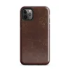 distressed dark mahogany leather texture with amber and tan crackle veining in an aged vintage patina style on Glossy Worn Leather Heritage Tough Case for iPhone - default view