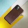 distressed dark mahogany leather texture with amber and tan crackle veining in an aged vintage patina style on Glossy Worn Leather Heritage Tough Case for iPhone - default view