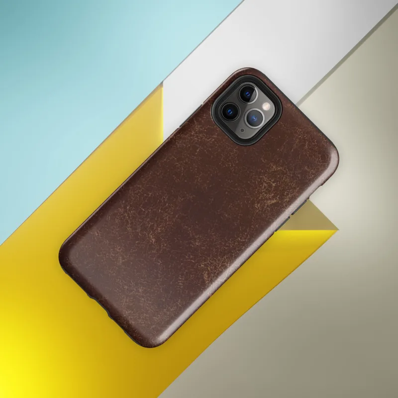 distressed dark mahogany leather texture with amber and tan crackle veining in an aged vintage patina style on Glossy Worn Leather Heritage Tough Case for iPhone - default view