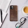 distressed burgundy and tan leather surface with crackled, aged patina and irregular worn markings on Glossy Worn Leather Vintage Tough Case for iPhone - default view