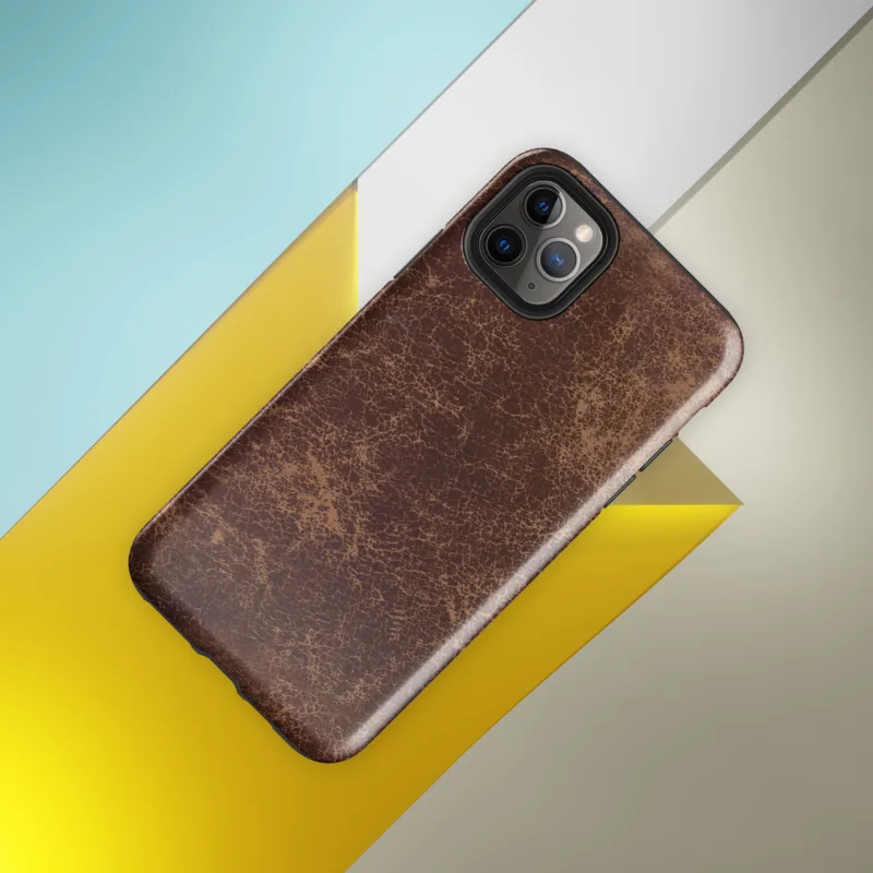 distressed burgundy and tan leather surface with crackled, aged patina and irregular worn markings on Glossy Worn Leather Vintage Tough Case for iPhone - default view