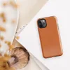 solid flat burnt orange in a warm earthy tone with subtle texture variation across the surface on Glossy Burnt Orange Solid Classic Tough Case for iPhone - default view