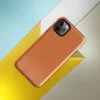 solid flat burnt orange in a warm earthy tone with subtle texture variation across the surface on Glossy Burnt Orange Solid Classic Tough Case for iPhone - default view