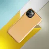 flat solid warm golden apricot color with a smooth matte paper-like texture and subtle natural fiber grain on Glossy Golden Hour Minimal Tough Case for iPhone - default view