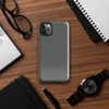 close-up woven linen fabric texture in deep charcoal and slate grey tones with subtle thread variation on Glossy Slate Linen Texture Tough Case for iPhone - default view