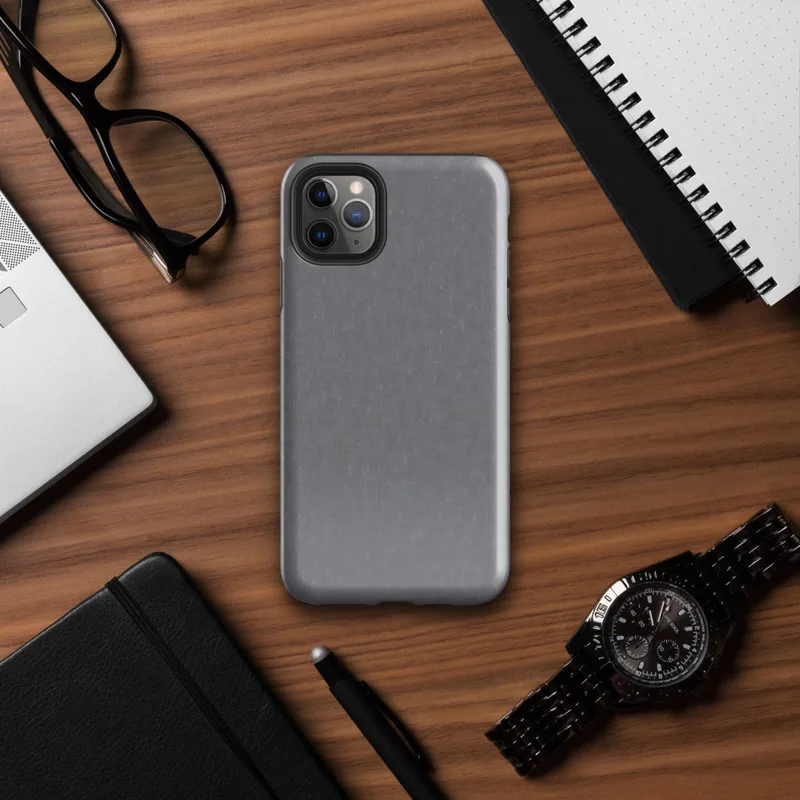 close-up woven chambray fabric texture in muted steel grey with subtle warm undertones and soft tonal variation on Glossy Steel Grey Chambray Texture Tough Case for iPhone - default view