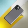 close-up woven chambray fabric texture in muted steel grey with subtle warm undertones and soft tonal variation on Glossy Steel Grey Chambray Texture Tough Case for iPhone - default view