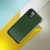 Glossy Forest Green Quilted Grid Tough Case for iPhone — deep forest green quilted fabric surface with a stitched grid