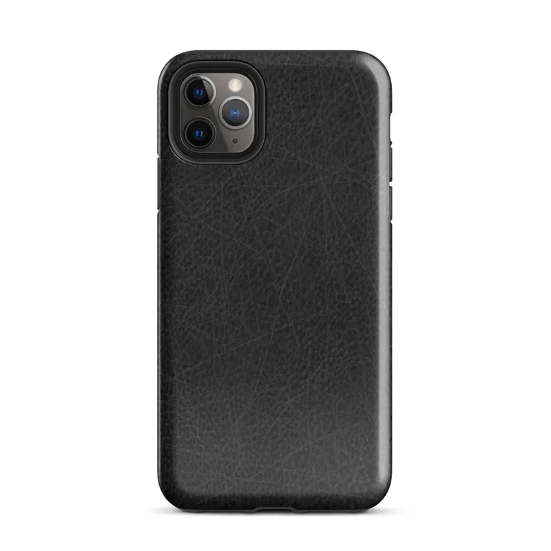 Glossy Scratched Black Leather Tough Case for iPhone — close-up black leather surface with fine grain pores and scattered