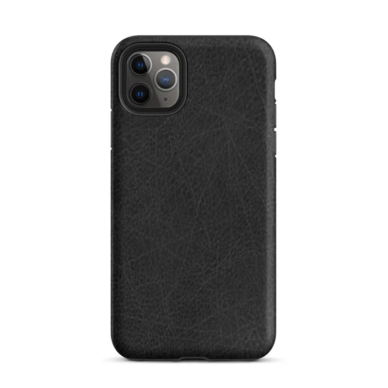Matte Scratched Black Leather Tough Case for iPhone — close-up black leather surface with fine grain pores and scattered