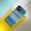 Glossy Ocean Wave Lines MagSafe Tough Case for iPhone — wavy white horizontal lines flowing across a deep teal blue