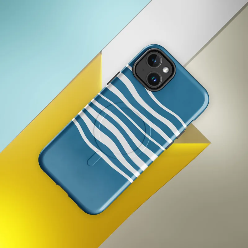 Glossy Ocean Wave Lines MagSafe Tough Case for iPhone — wavy white horizontal lines flowing across a deep teal blue