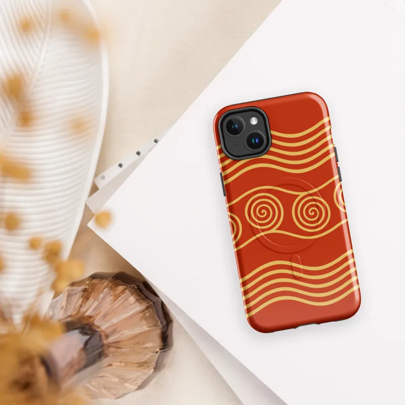 Glossy Ancient Waves Gold Spiral MagSafe Tough Case for iPhone — repeating golden spiral circles and wavy parallel lines