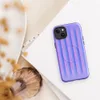 Glossy Neon Ridges MagSafe Tough Case for iPhone — soft vertical ridges with a 3D ripple effect in periwinkle blue and vivid