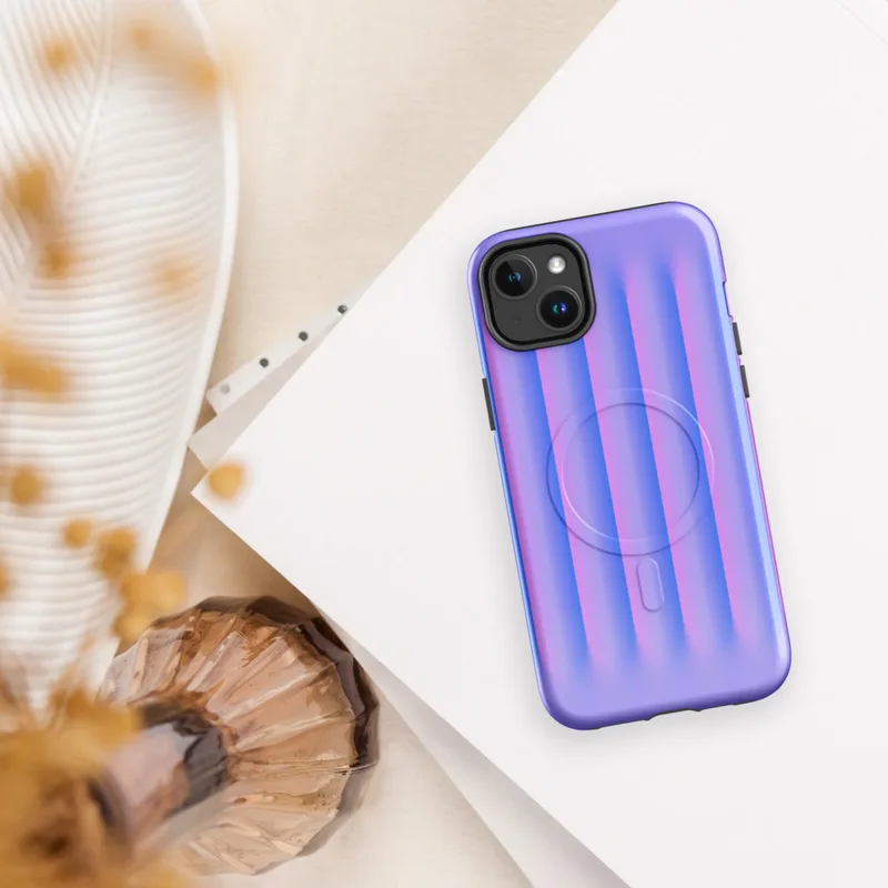 Glossy Neon Ridges MagSafe Tough Case for iPhone — soft vertical ridges with a 3D ripple effect in periwinkle blue and vivid