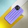 Glossy Neon Ridges MagSafe Tough Case for iPhone — soft vertical ridges with a 3D ripple effect in periwinkle blue and vivid