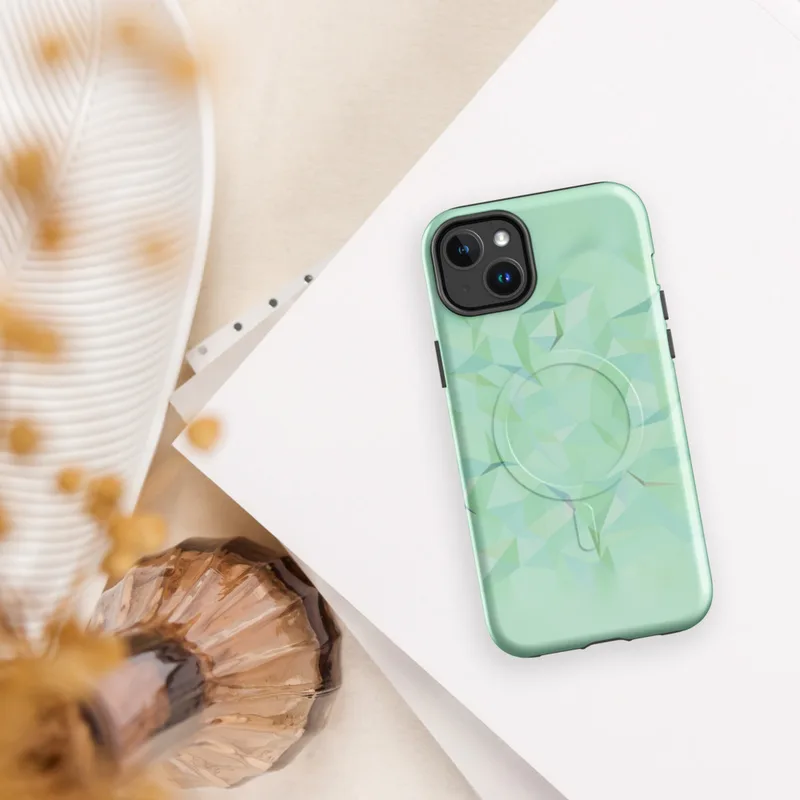Glossy Mint Crystal Geo MagSafe Tough Case for iPhone — low-poly geometric pattern of faceted triangles in soft mint, sage