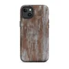 Matte Rusted Iron Fortress MagSafe Tough Case for iPhone — heavily weathered metal panels with streaking rust in burnt