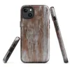 Glossy Rusted Iron Fortress MagSafe Tough Case for iPhone — heavily weathered metal panels with streaking rust in burnt
