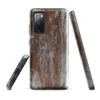 Glossy Industrial Rust Storm Tough Case for Samsung — weathered concrete panels with streaks of rust, burnt sienna