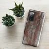 Glossy Industrial Rust Storm Tough Case for Samsung — weathered concrete panels with streaks of rust, burnt sienna