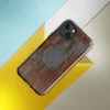 Glossy Iron Decay Rust Metal MagSafe Tough Case for iPhone — heavily corroded metal surface with streaks of burnt orange