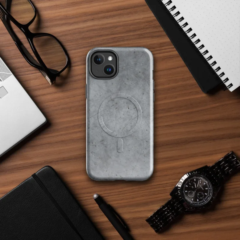 Glossy Scratched Steel Urban Armor MagSafe Tough Case for iPhone — weathered grey metal surface with fine random scratches