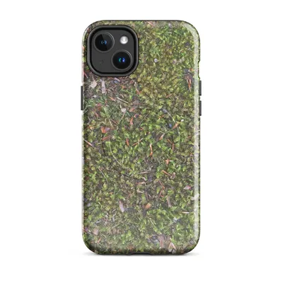 top-down photorealistic view of green moss ground scattered with auburn pine needles, bark chips, and small pebbles in muted earthy tones on Glossy Forest Floor Mossy Ground MagSafe Tough Case for iPhone - default - Front view