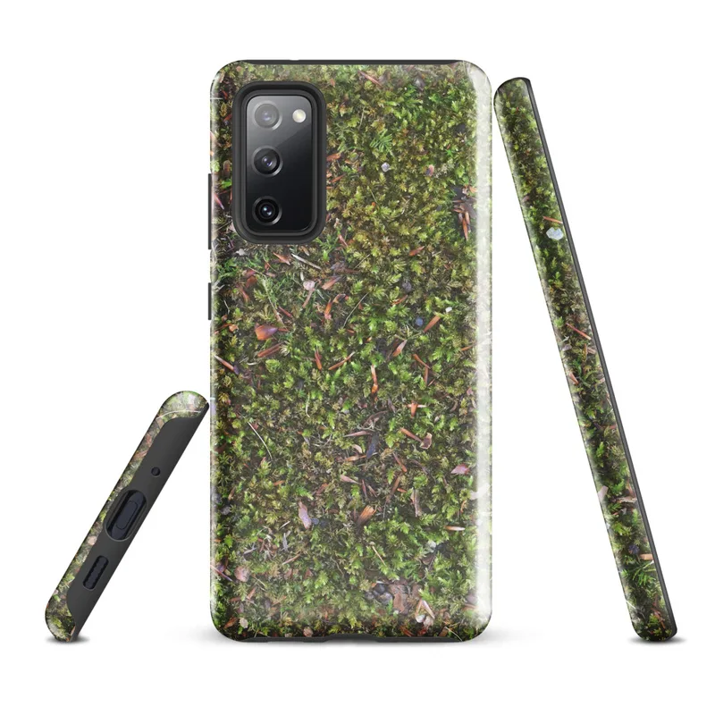 Glossy Forest Floor Moss Tough Case for Samsung — top-down view of dense green moss covered with scattered pine needles
