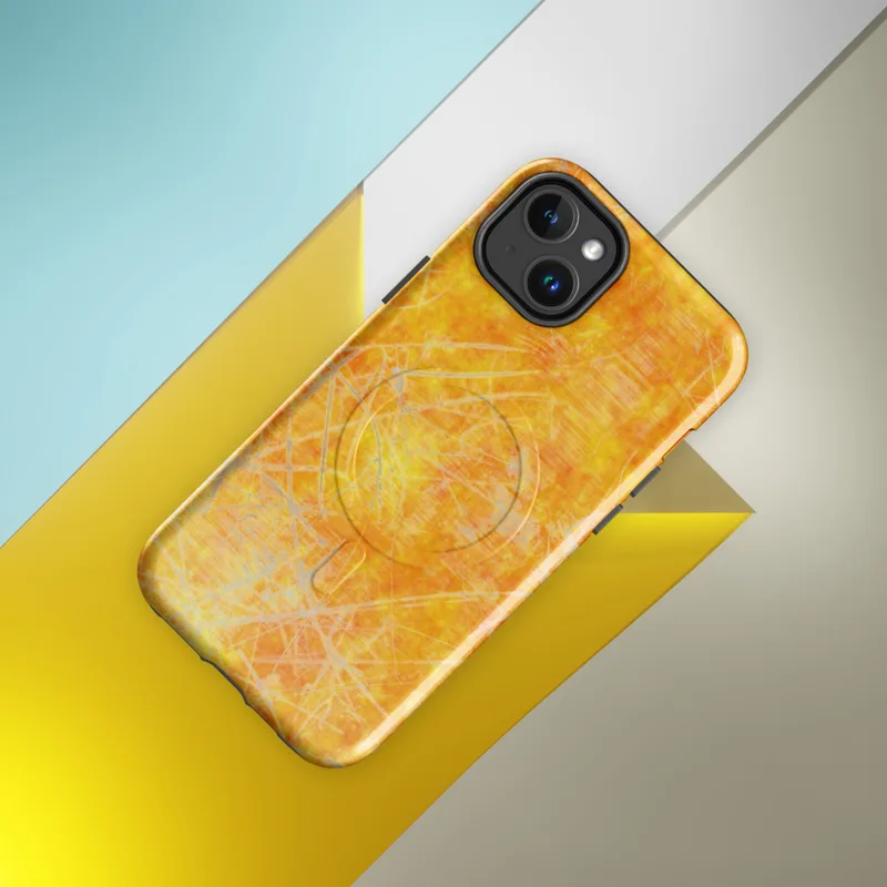 Glossy Solar Flare Scratch MagSafe Tough Case for iPhone — mottled orange and golden yellow surface overlaid with scattered