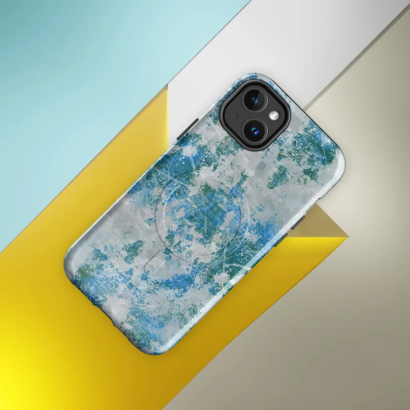 Glossy Frozen Tide Abstract MagSafe Tough Case for iPhone — layered abstract texture of icy blue, deep teal, and pale grey