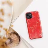 Glossy Red Chaos Splatter MagSafe Tough Case for iPhone — explosive silver and white paint splatters with wild brushstrokes