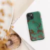 Glossy Patina Copper Weathered MagSafe Tough Case for iPhone — aged copper surface with teal-green verdigris patina