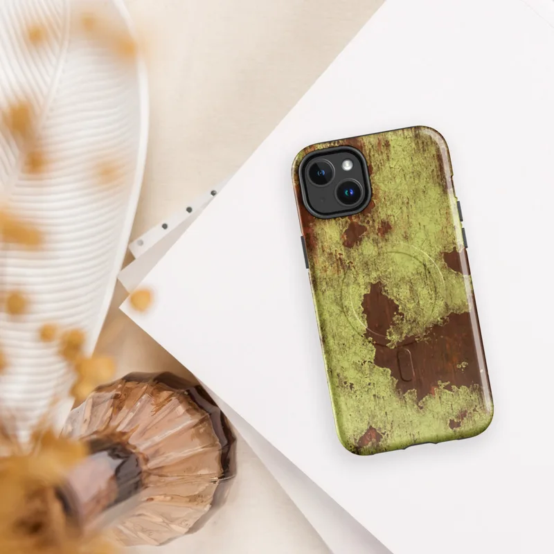 Glossy Corroded Rust Peeling Paint MagSafe Tough Case for iPhone — peeling olive-green paint revealing deep rust-red metal