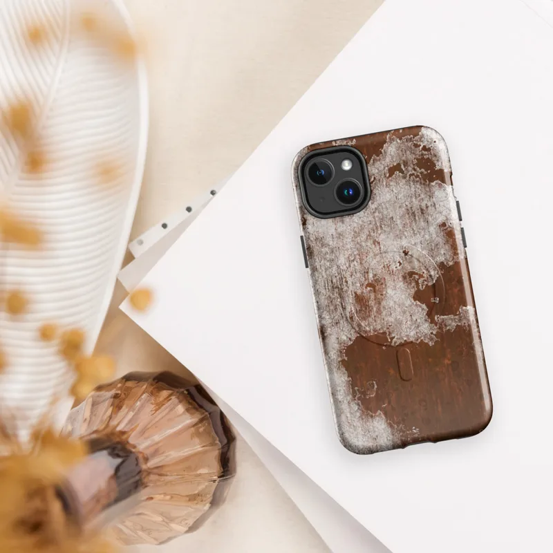 Glossy Rust and Ruin MagSafe Tough Case for iPhone — close-up texture of deep rust-brown oxidized metal beneath cracked