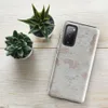 Glossy Ancient Plaster Wall Tough Case for Samsung — close-up of weathered plaster wall with peeling chalky white layers